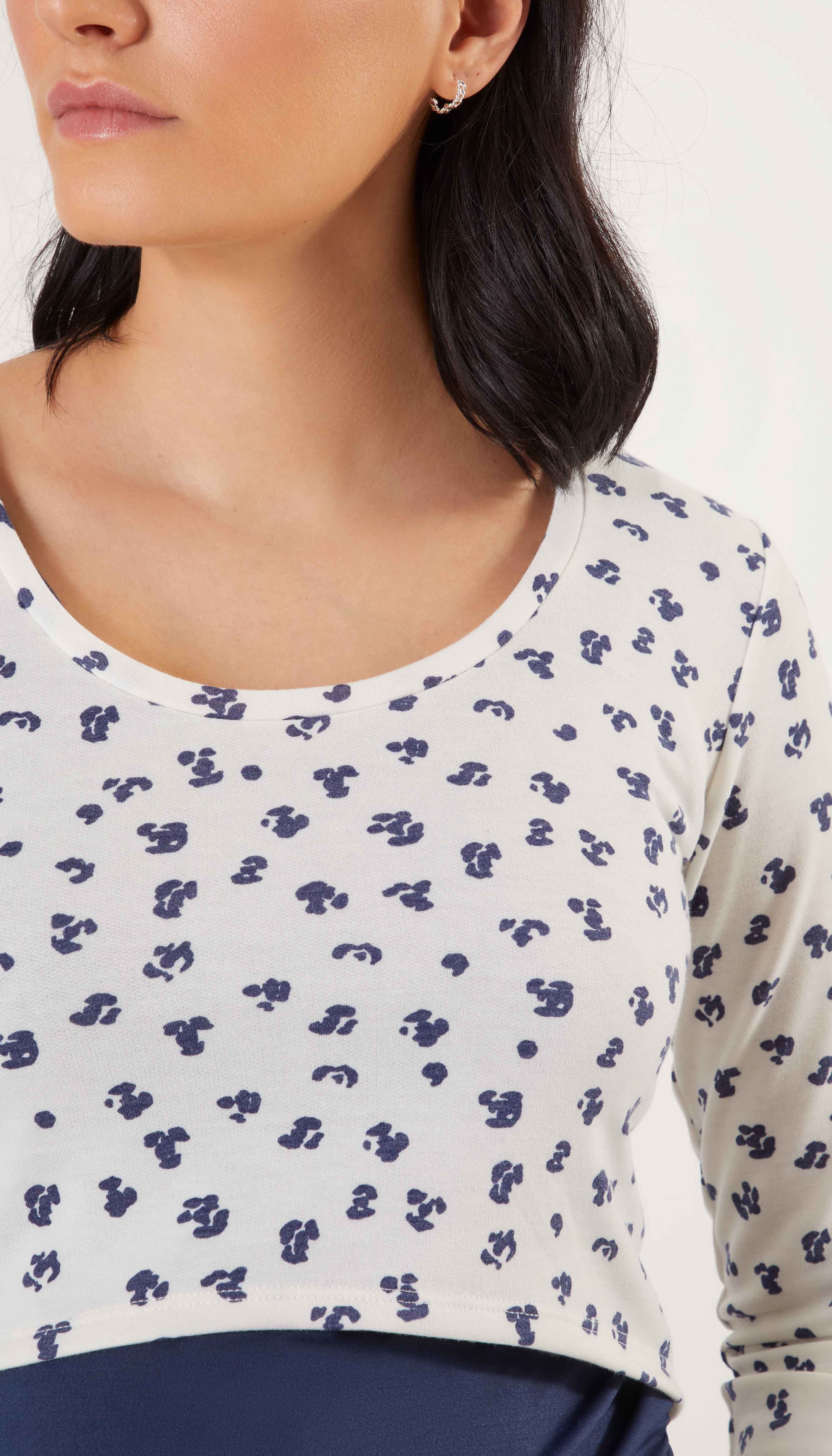 Stowaway Collection Cropped Maternity Top & Nursing Cover Shown Over Navy Tank Print Detail